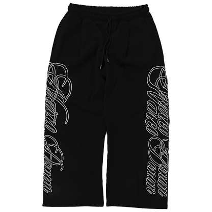 Black pants with white text design on a white background